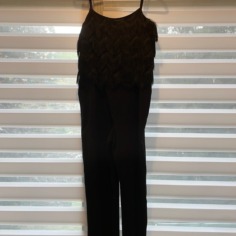 BCBG Maxazria romper In black. NEW WITH TAGS